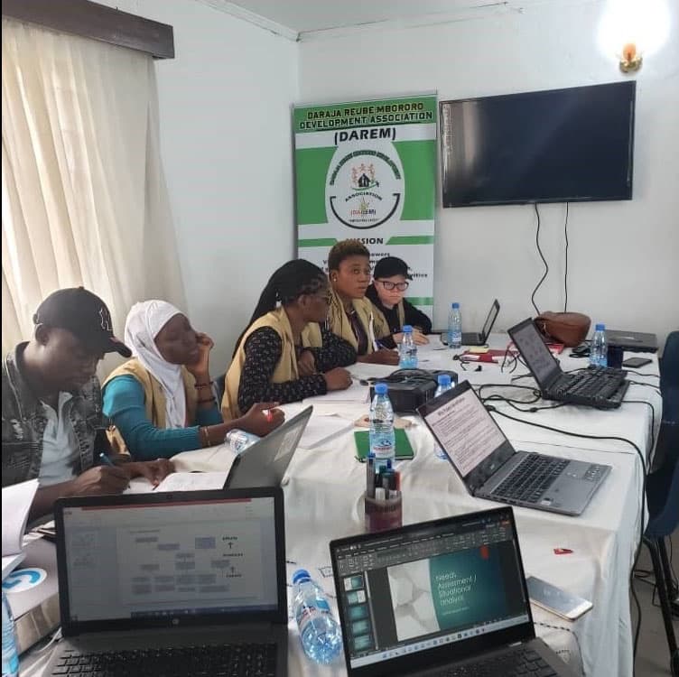 A field team collecting and reviewing monitoring information.