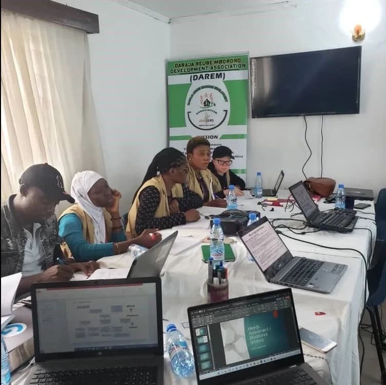 A field team collecting and reviewing monitoring information.